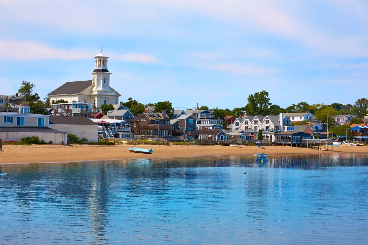 Provincetown Harbor waterfront and fishing boats at sunset